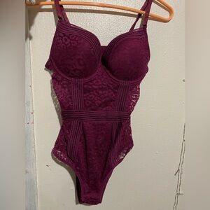 Cute purple body suit, it’s see through on the sides and back!